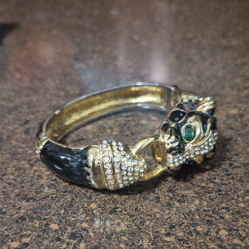 Elegant Gold and Black Panther Bracelet
